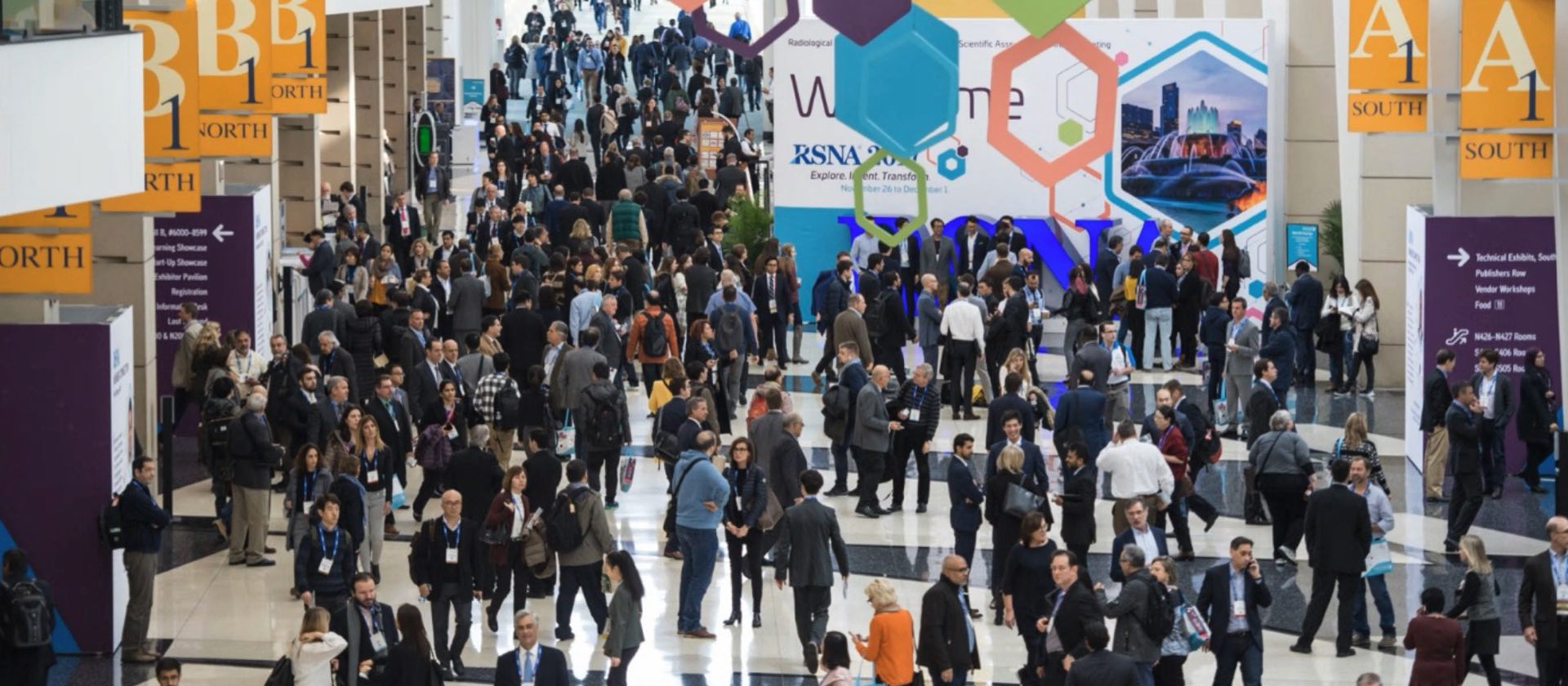 Delegates crossing a packed convention concourse at McCormick Place, Chicago